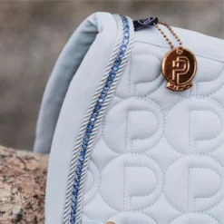 2023 Eskadron Platinum Softshell Saddle Cloth 215539520310 - Powder Blue Colour Powder Blue -Ariat Shop 202320Eskadron20Platinum20Softshell20Saddle20Cloth2021553952031020 20Powder20Blue20Close20Up.700x700