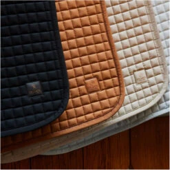 2023 Eskadron Platinum Cotton Saddle Pad 211039412030 - Cognac Colour Cognac -Ariat Shop 6449 202320Eskadron20Platinum20Cotton20Saddle20Pad2021103941203020 20Tan20Taupe20Lifestyle202.700x700